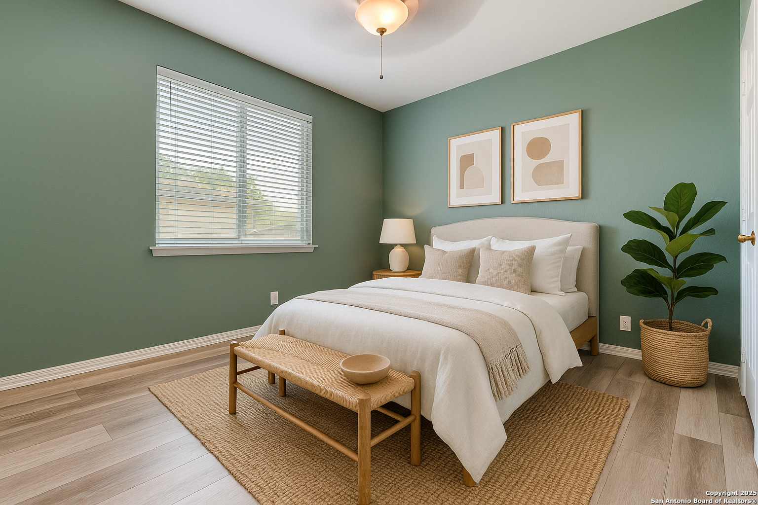 112 Spring Fawn Cibolo, TX 78108 - Photo 20 of 26 a bedroom with a bed and a potted plant