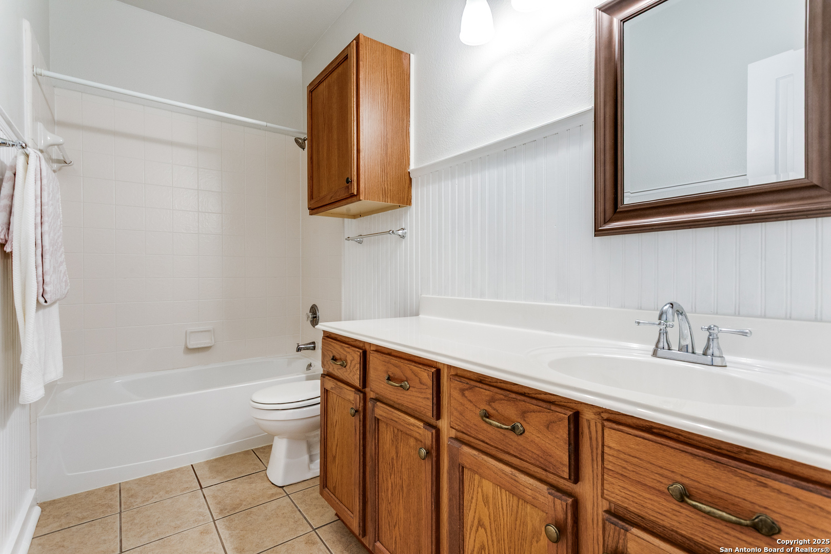 112 Spring Fawn Cibolo, TX 78108 - Photo 23 of 26 a bathroom with a sink a toilet and shower