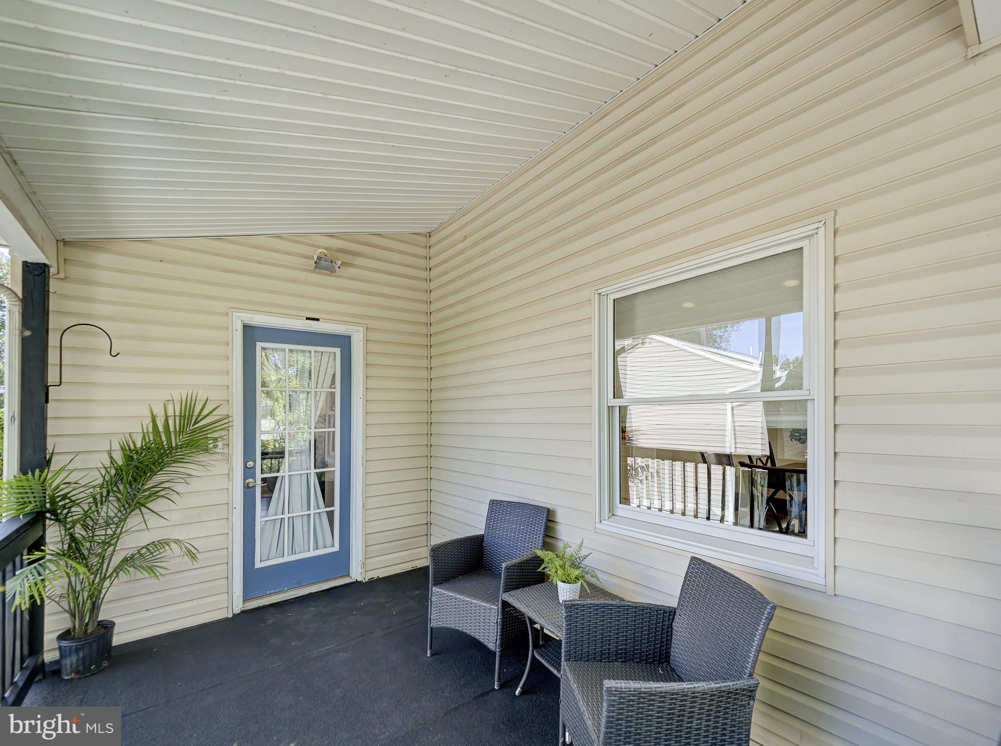 12 Creek Road Hazlet, NJ 07730 - Photo 25 of 42 Top floor charming porch with inviting entrance.