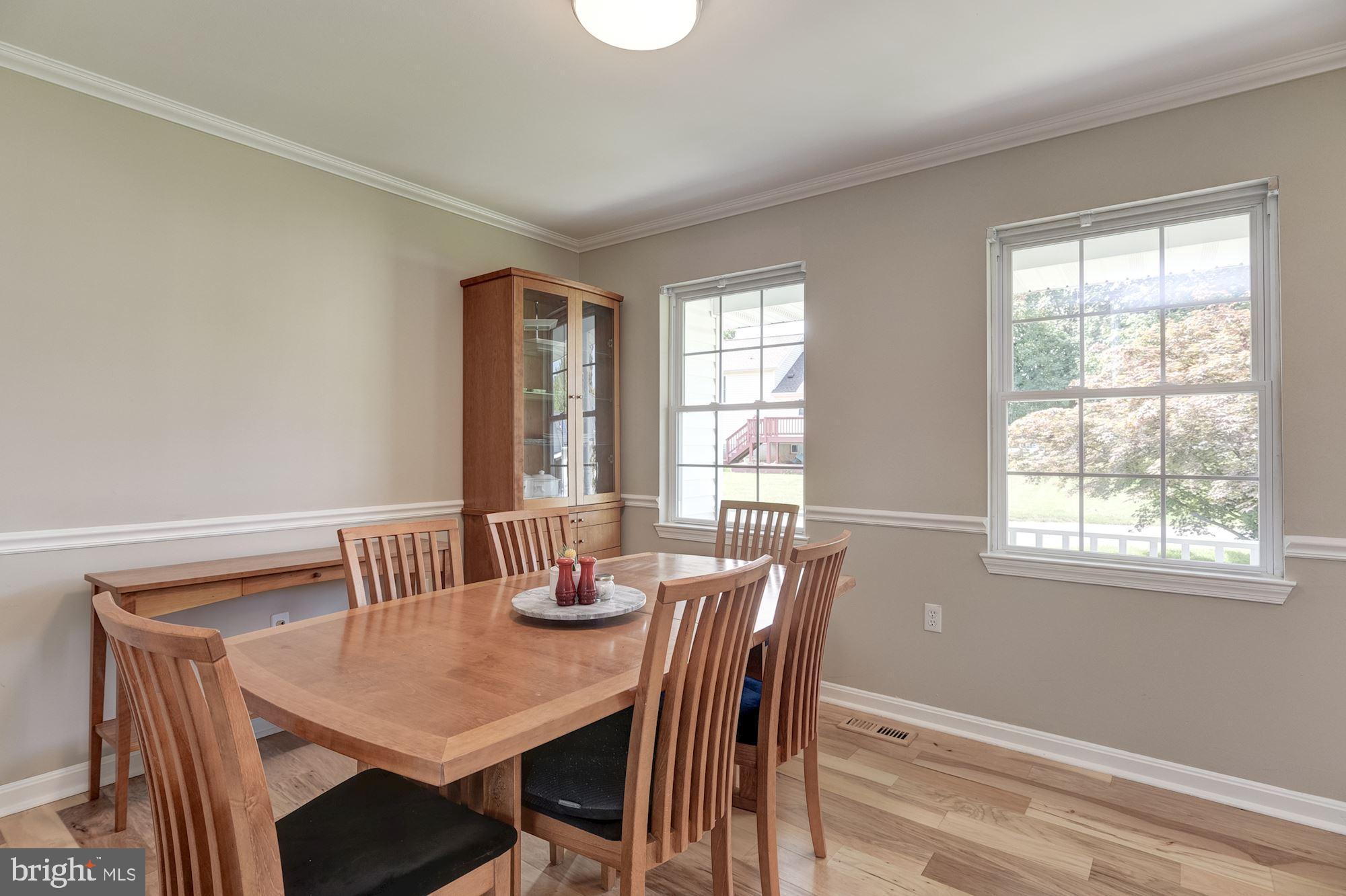 8702 Winands Road Randallstown, MD 21133 - Photo 11 of 32 a view of a dining room with furniture and window