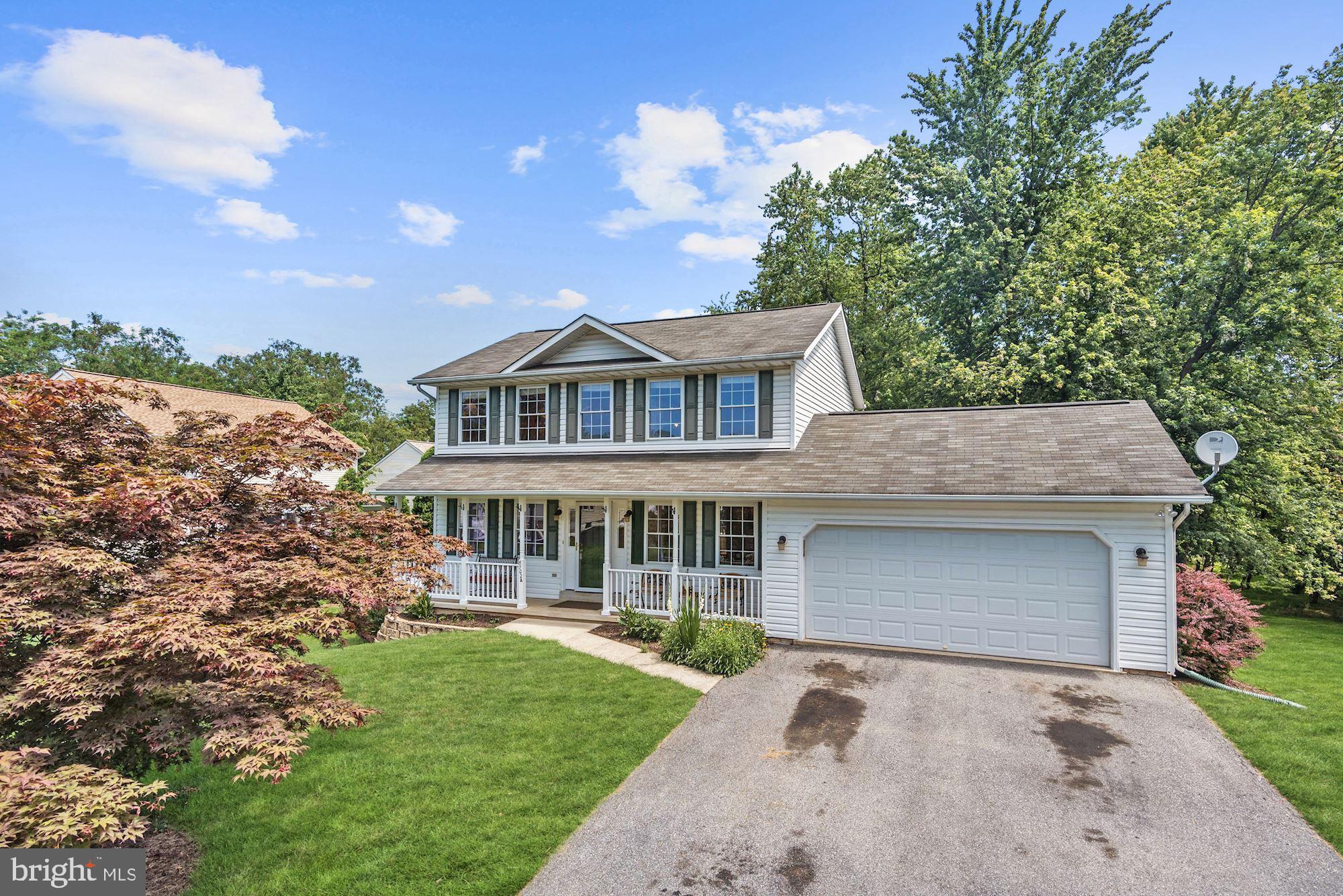 8702 Winands Road Randallstown, MD 21133 - Photo 24 of 32 front view of a house with a yard