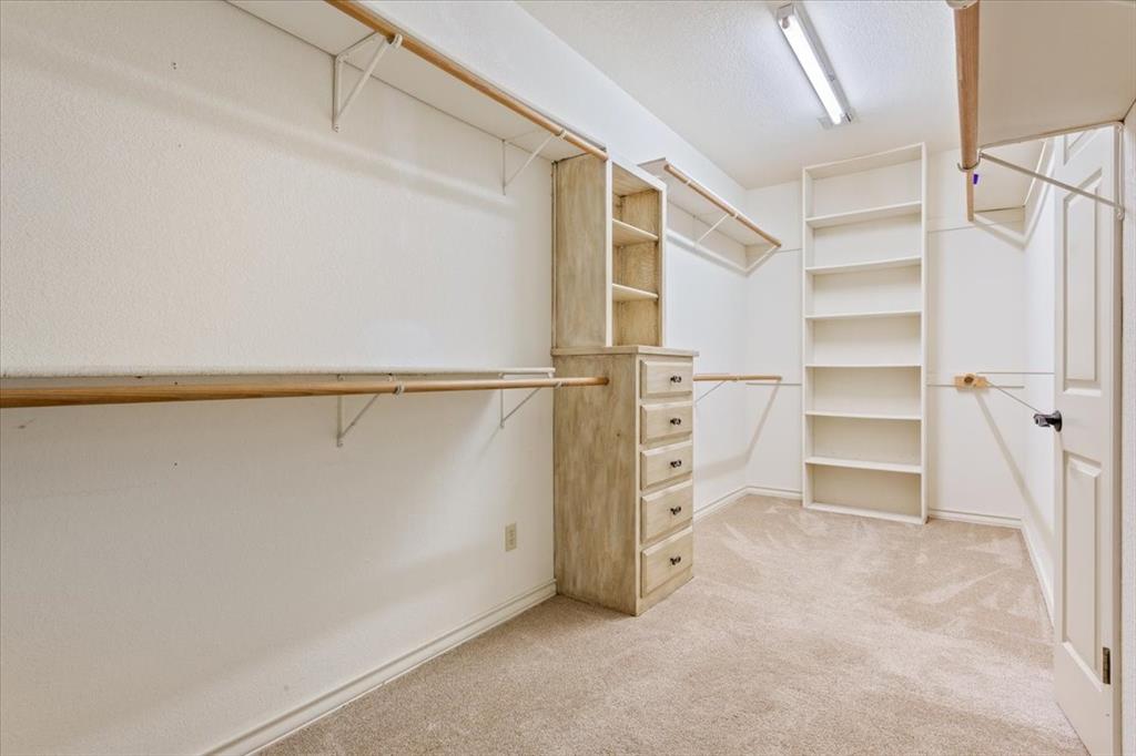 4843 South 3rd St Road Waco, TX 76706 - Photo 24 of 39 Walk in closet with light colored carpet