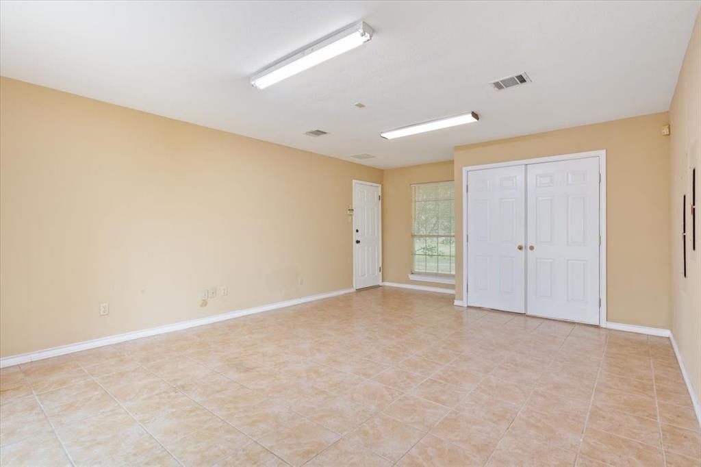 4843 South 3rd St Road Waco, TX 76706 - Photo 27 of 39 Empty room with visible vents and baseboards
