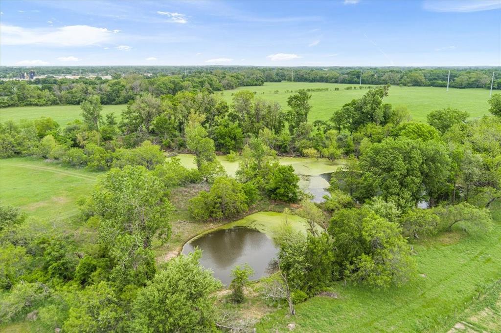 4843 South 3rd St Road Waco, TX 76706 - Photo 35 of 39 Birds eye view of property with a water view