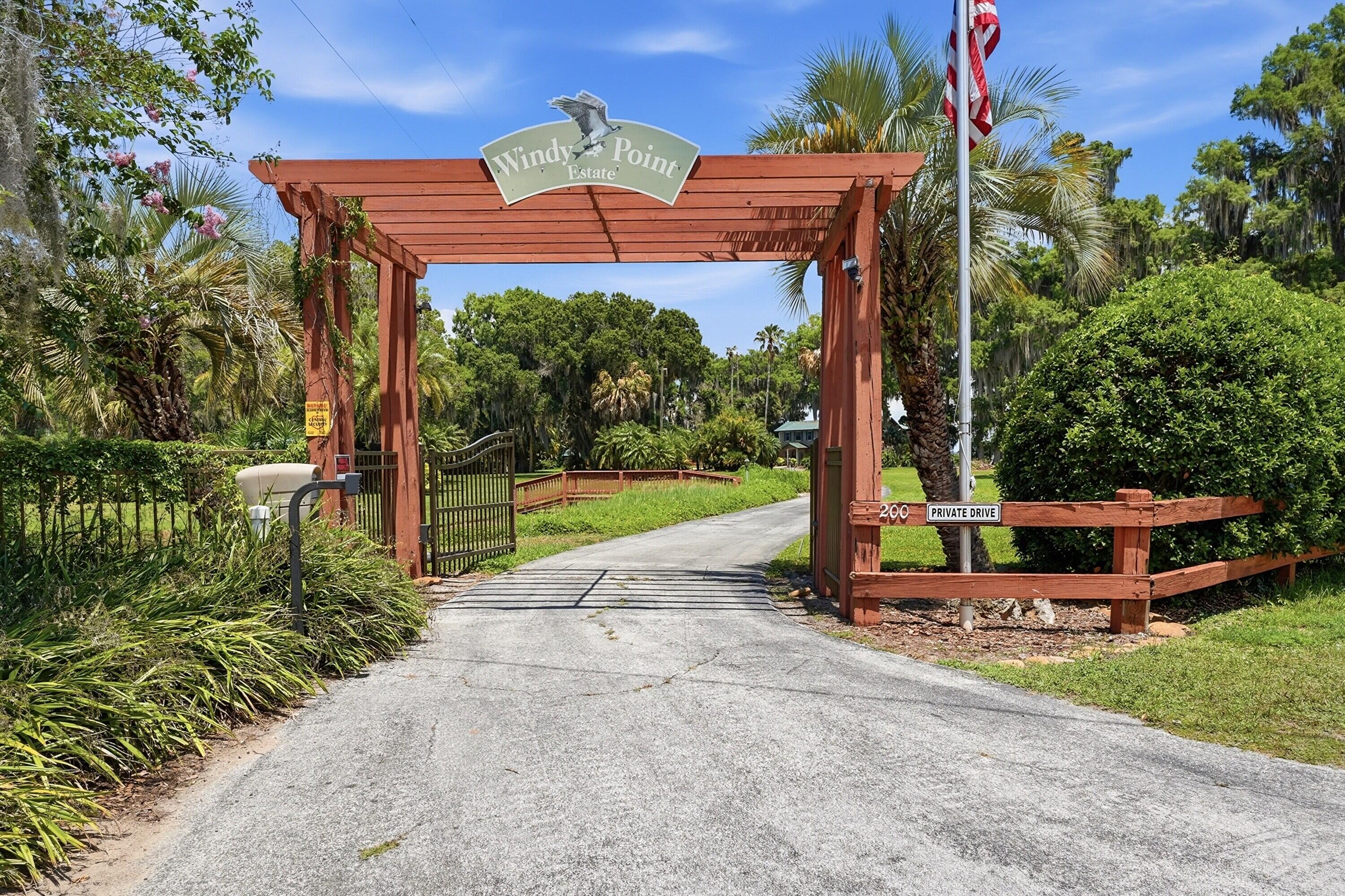 200 Windy Point Road Lake Placid, FL 33852 - Photo 58 of 74 a view of a chair and table in the garden