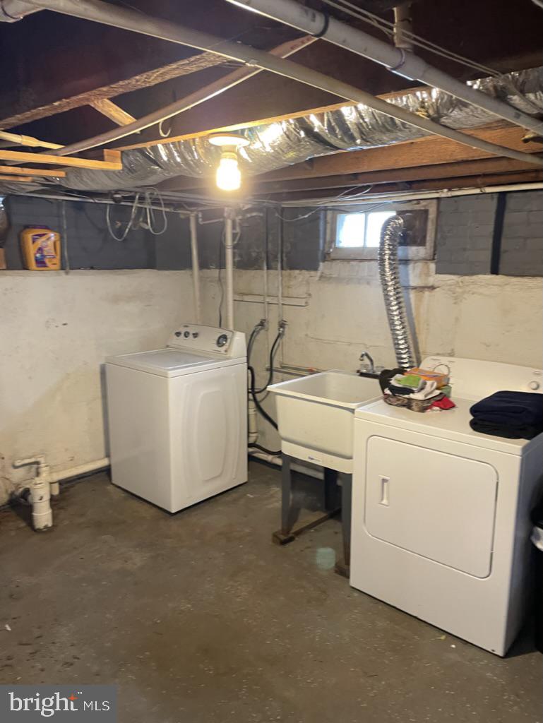 305 North Main Street Hurlock, MD 21643 - Photo 14 of 20 a utility room with dryer and washer