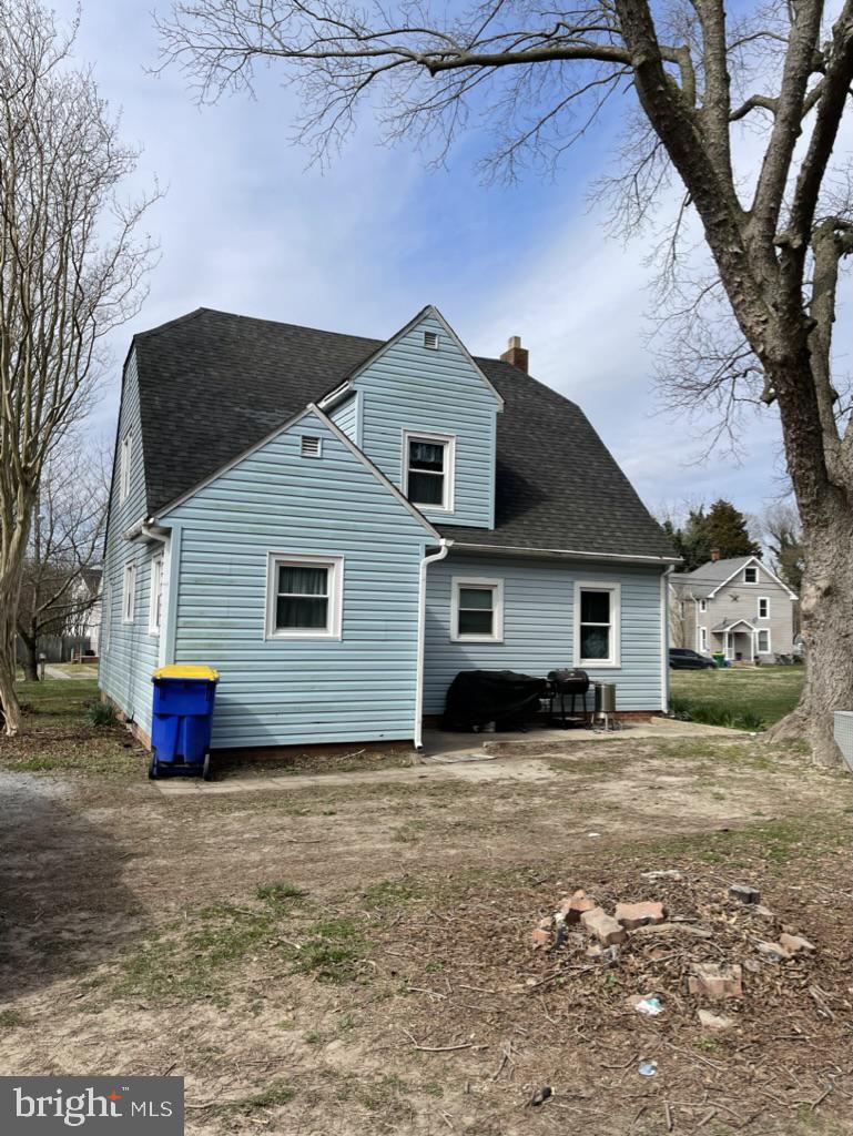 305 North Main Street Hurlock, MD 21643 - Photo 18 of 20 a front view of a house with a yard