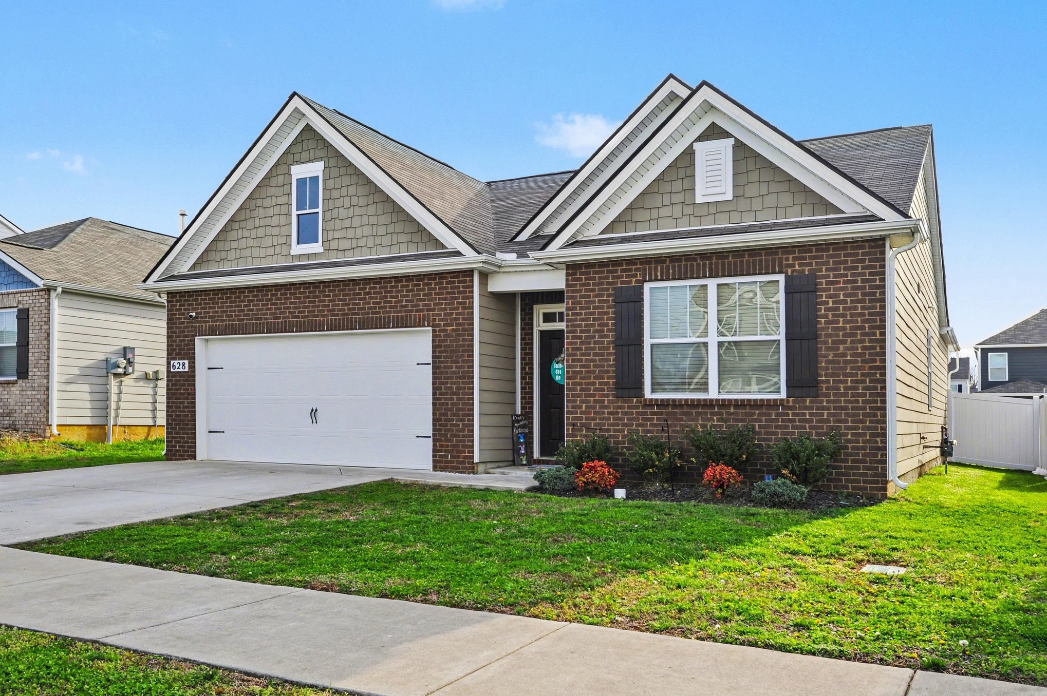 628 Pine Bloom Road Lebanon, TN 37087 - Photo 1 of 25 a front view of a house with garden