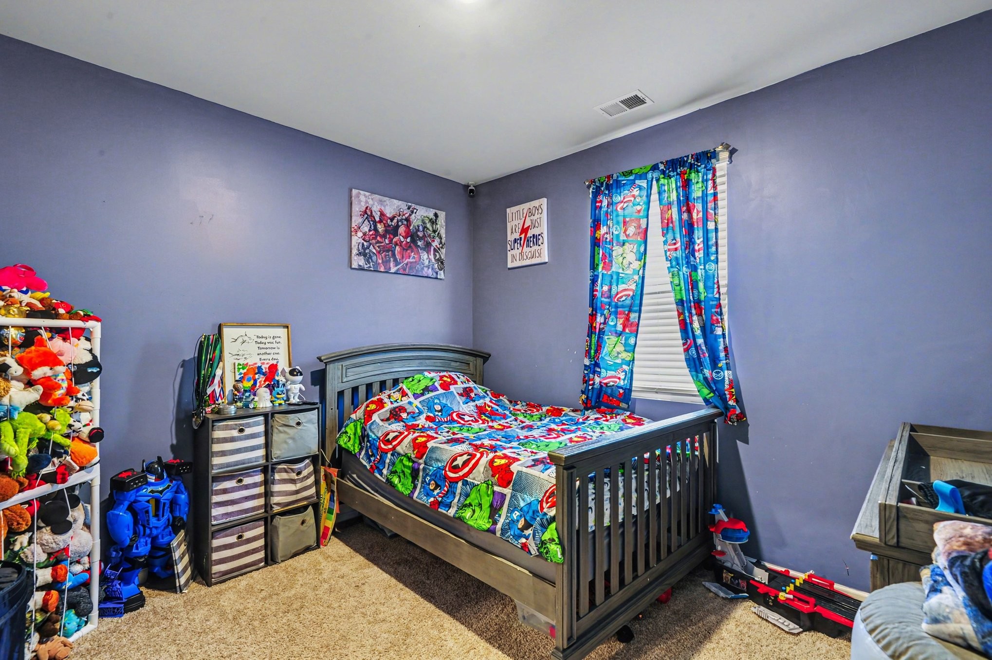 628 Pine Bloom Road Lebanon, TN 37087 - Photo 10 of 25 a bedroom with a baby crib toys and dresser