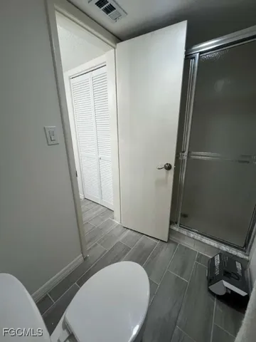 a bathroom with a sink and toilet