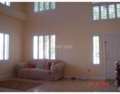 7940 Sky Ridge Road Las Vegas, NV 89128 - Photo 3 of 12 Living Room.