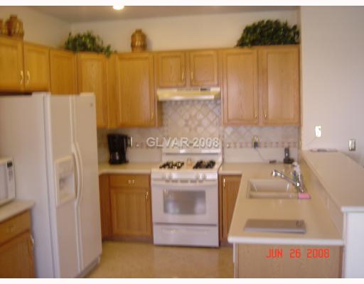 7940 Sky Ridge Road Las Vegas, NV 89128 - Photo 5 of 12 Kitchen.