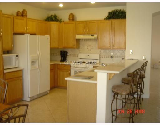 7940 Sky Ridge Road Las Vegas, NV 89128 - Photo 6 of 12 Kitchen.