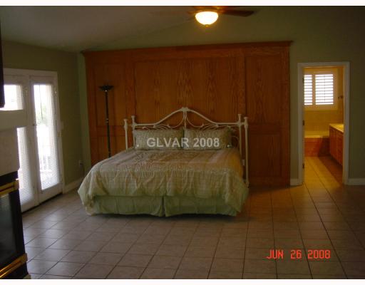 7940 Sky Ridge Road Las Vegas, NV 89128 - Photo 9 of 12 Master Bedroom.