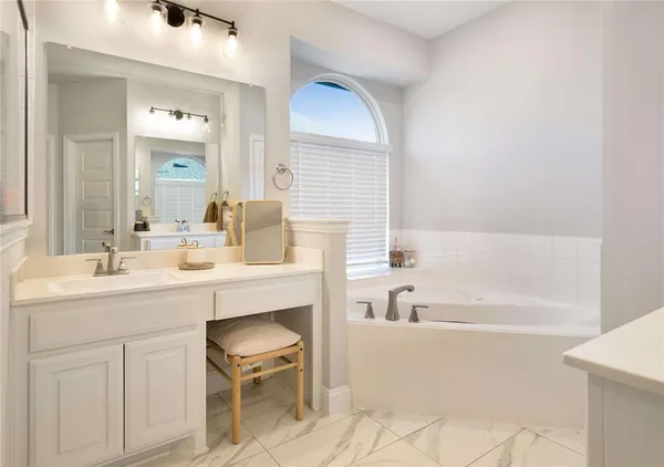 a bathroom with a sink and a bathtub