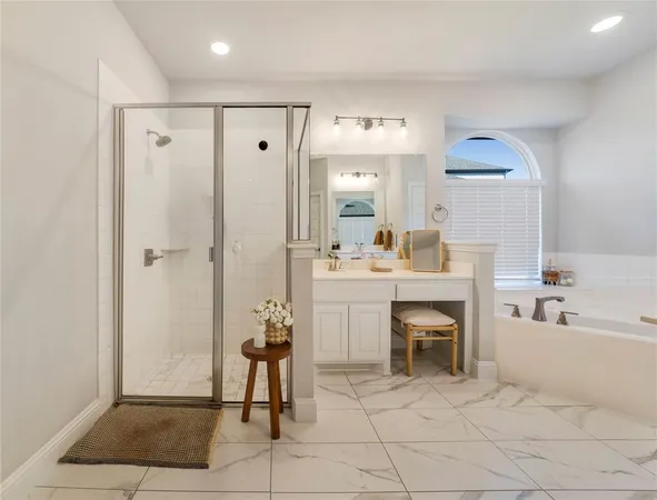 a bathroom with a sink vanity and a mirror