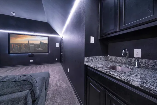 a bathroom with a sink and a vanity