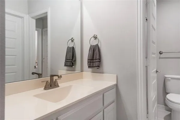 a bathroom with a sink and a toilet