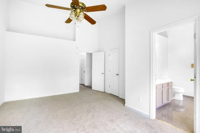 a white bath tub sitting next to a window