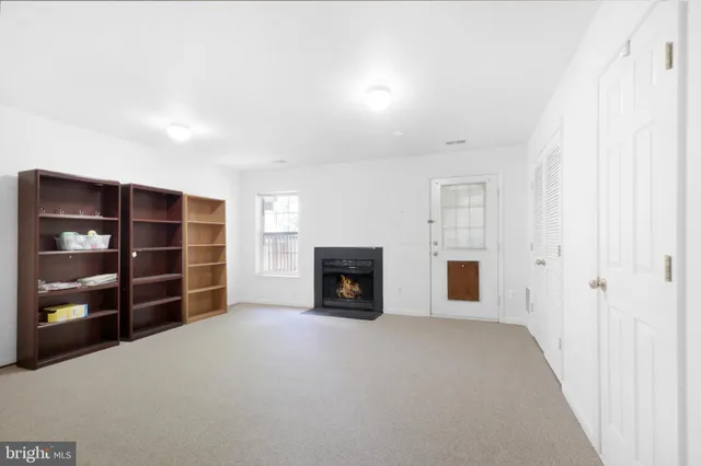 a view of a livingroom with a fireplace