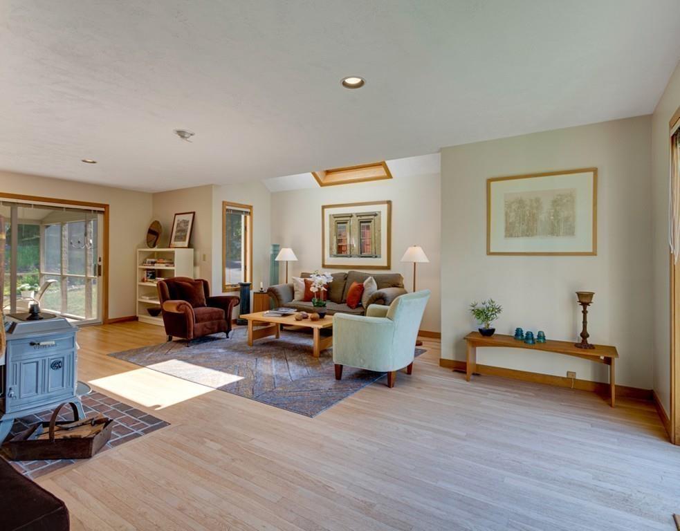 161 Tower Road Lincoln, MA 01773 - Photo 9 of 28 a living room with furniture and a wooden floor