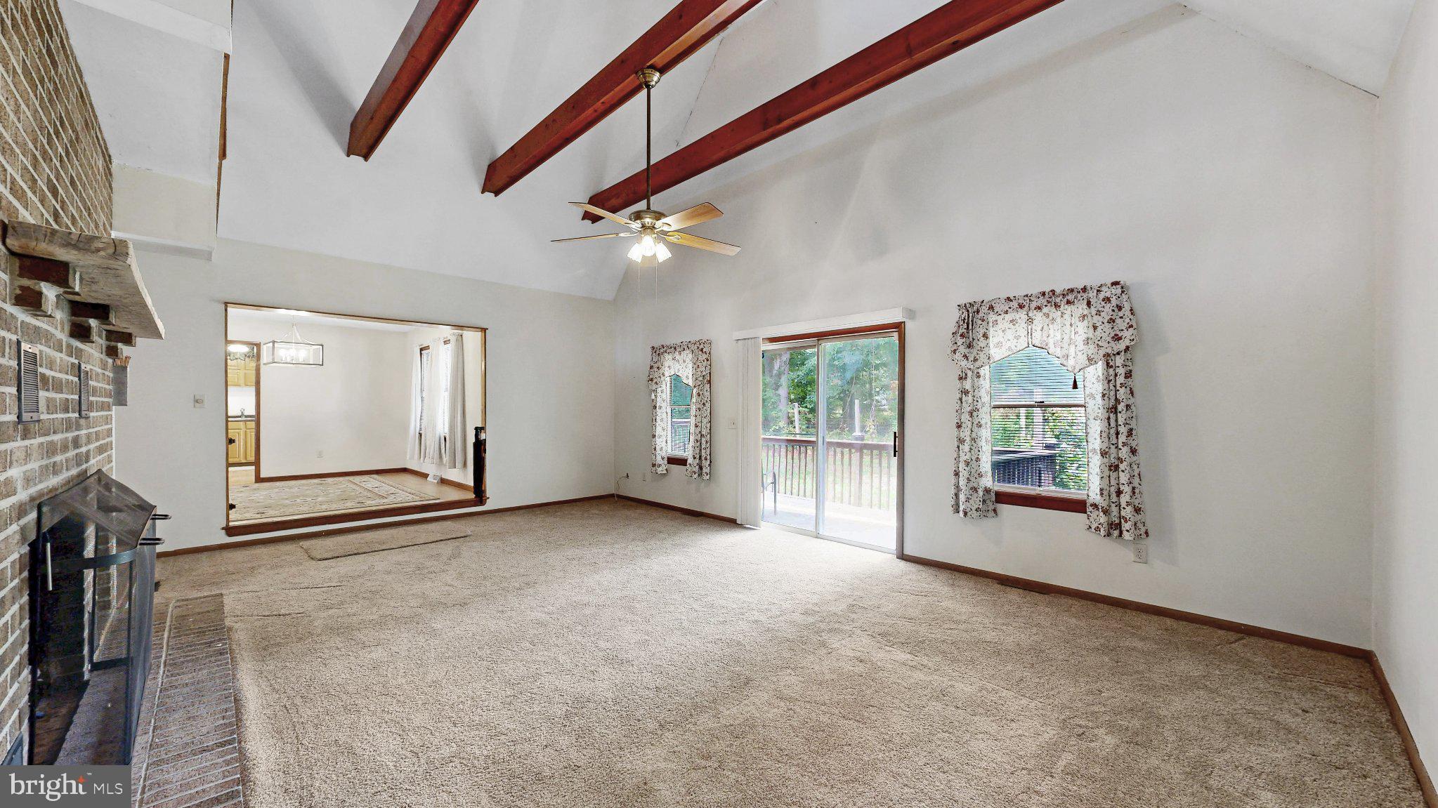 163 Pratts Branch Road Felton, DE 19943 - Photo 13 of 55 Spacious living area with vaulted ceilings.