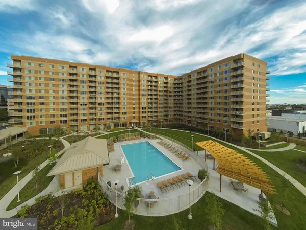 a view of swimming pool from a balcony
