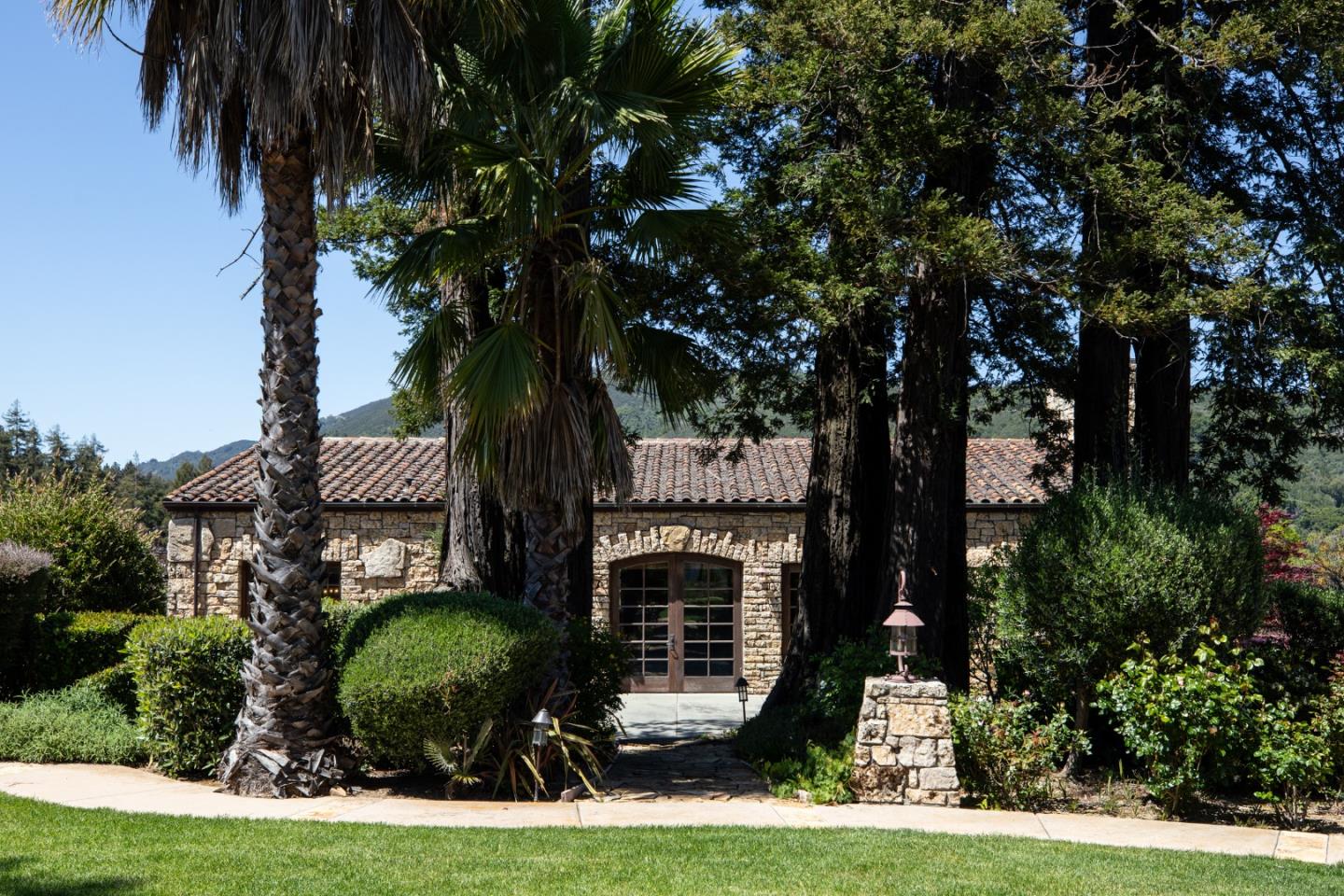 18550 Black Road Los Gatos, CA 95033 - Photo 17 of 44 a front view of a house with garden