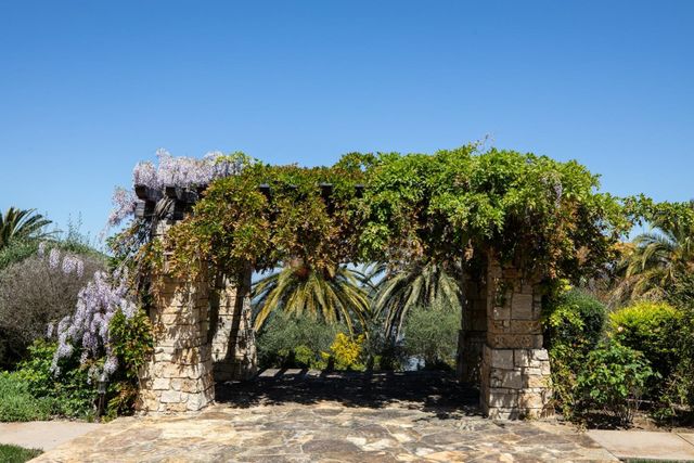 a backyard of a house with lots of green space