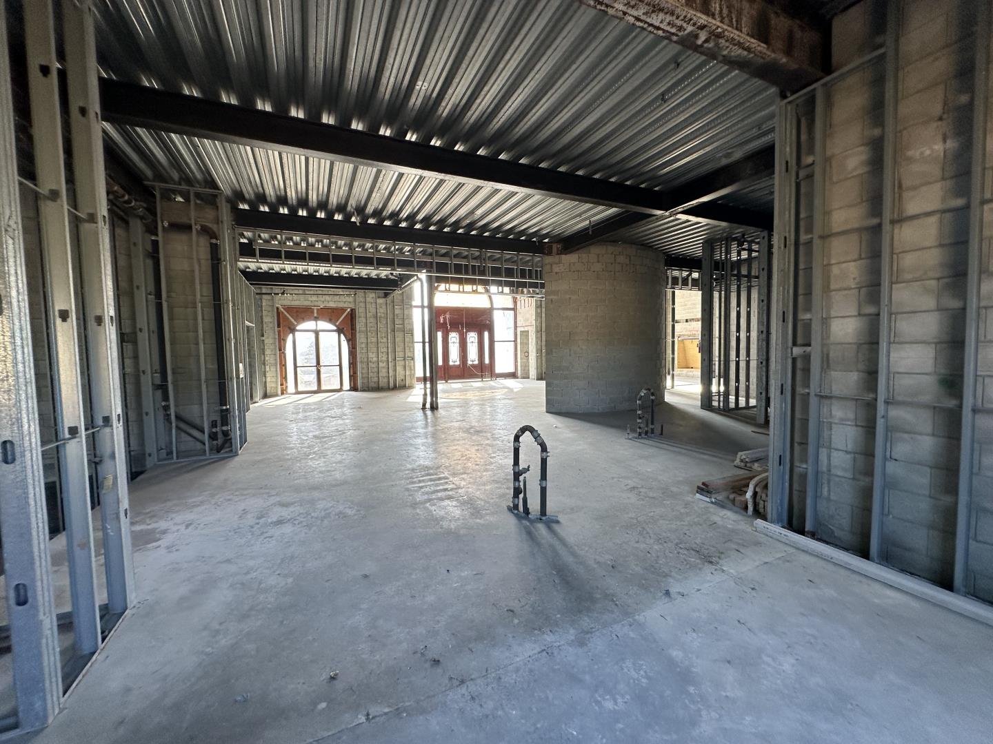 18550 Black Road Los Gatos, CA 95033 - Photo 30 of 44 a view of a livingroom with wooden furniture and windows