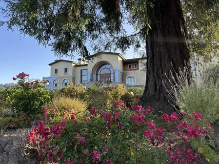 a view of multiple houses with a street