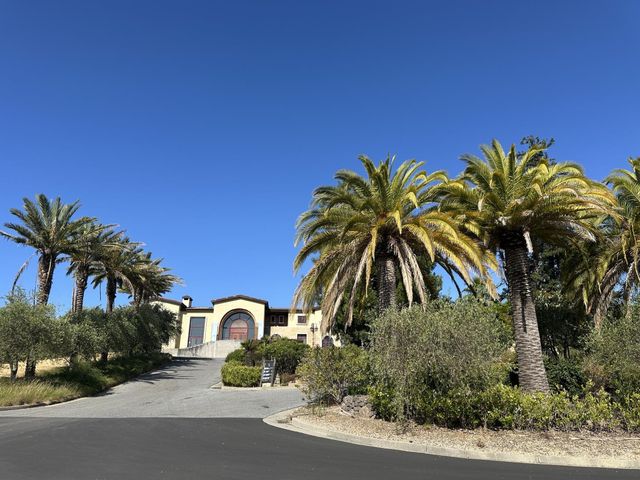 a view of multiple houses with a yard