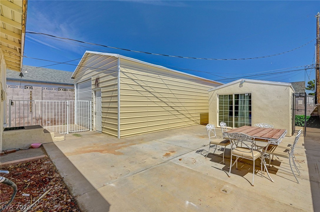 629 L Avenue Boulder City, NV 89005 - Photo 40 of 46 View of patio with an outdoor structure and outdoor dining space