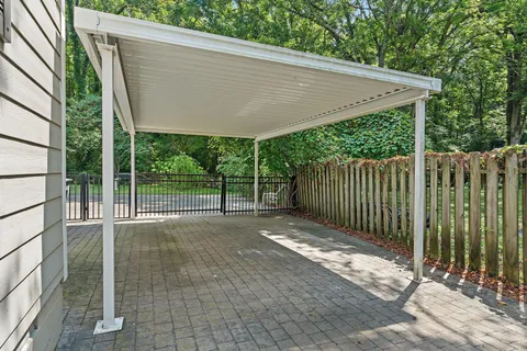 a view of a backyard with a garden