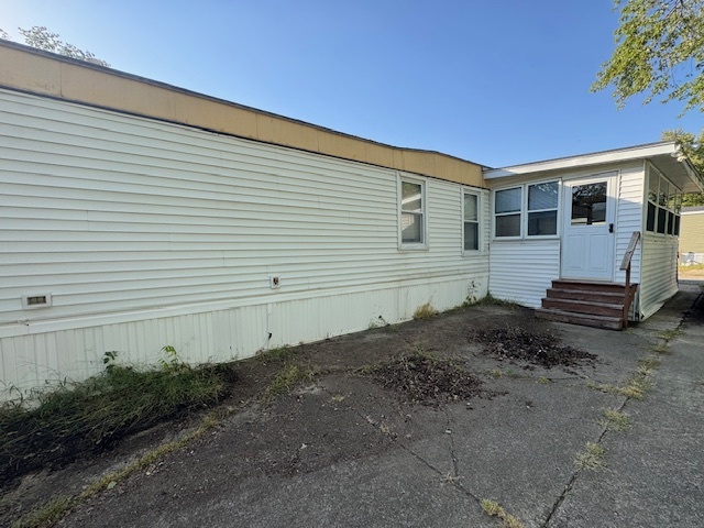 135 Avenue C Bloomington, IL 61704 - Photo 2 of 15 a view of a house with a yard