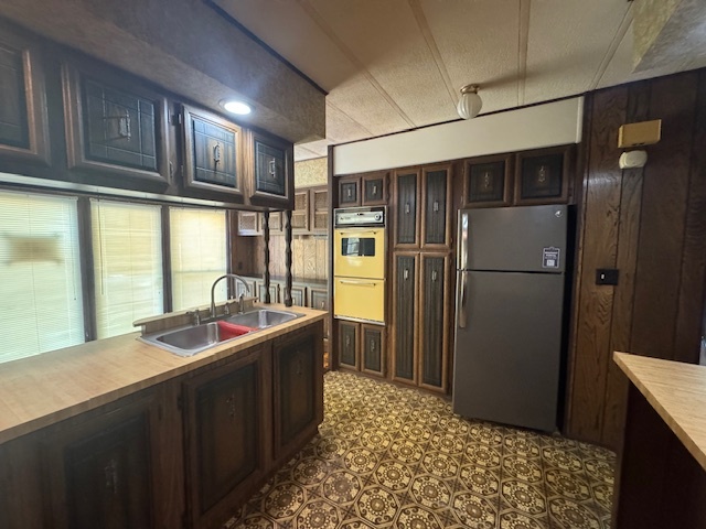 135 Avenue C Bloomington, IL 61704 - Photo 9 of 15 a kitchen with stainless steel appliances granite countertop a refrigerator and a sink