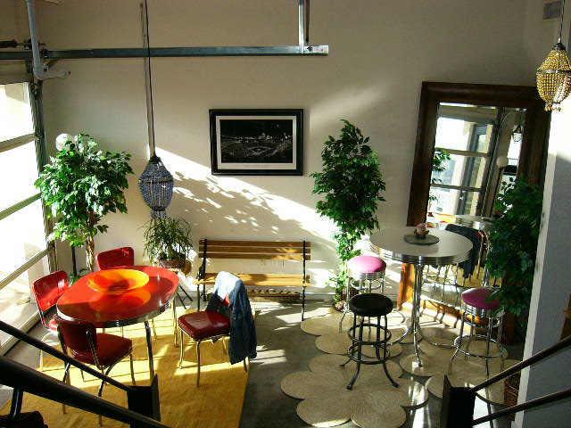 914 East Osborn Road, Unit 209 Phoenix, AZ 85014 - Photo 3 of 5 a lobby with furniture and potted plants