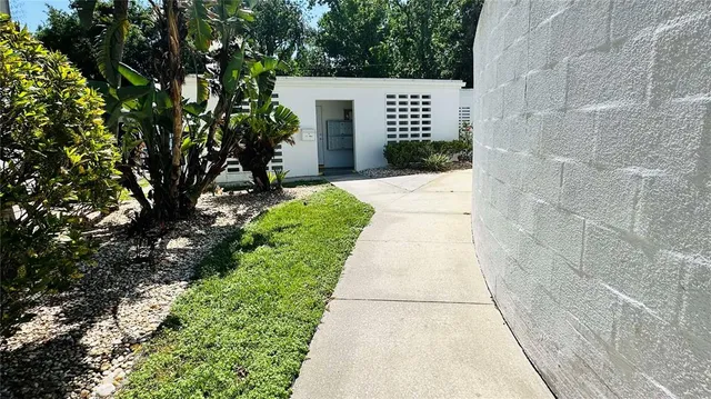 a view of a back yard of the house