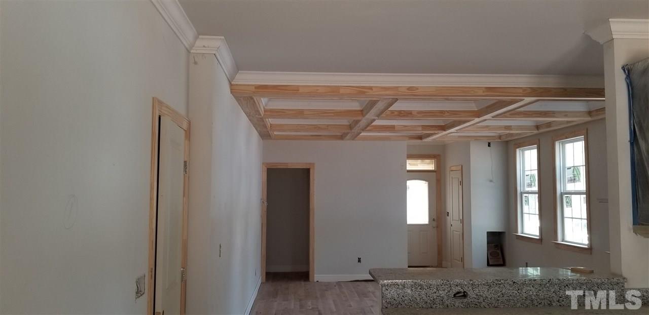 447 Rose Lane Raleigh, NC 27610 - Photo 2 of 8 a view of a hallway with windows