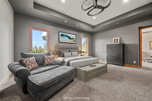 a bathroom with a sink a mirror a vanity and a shower