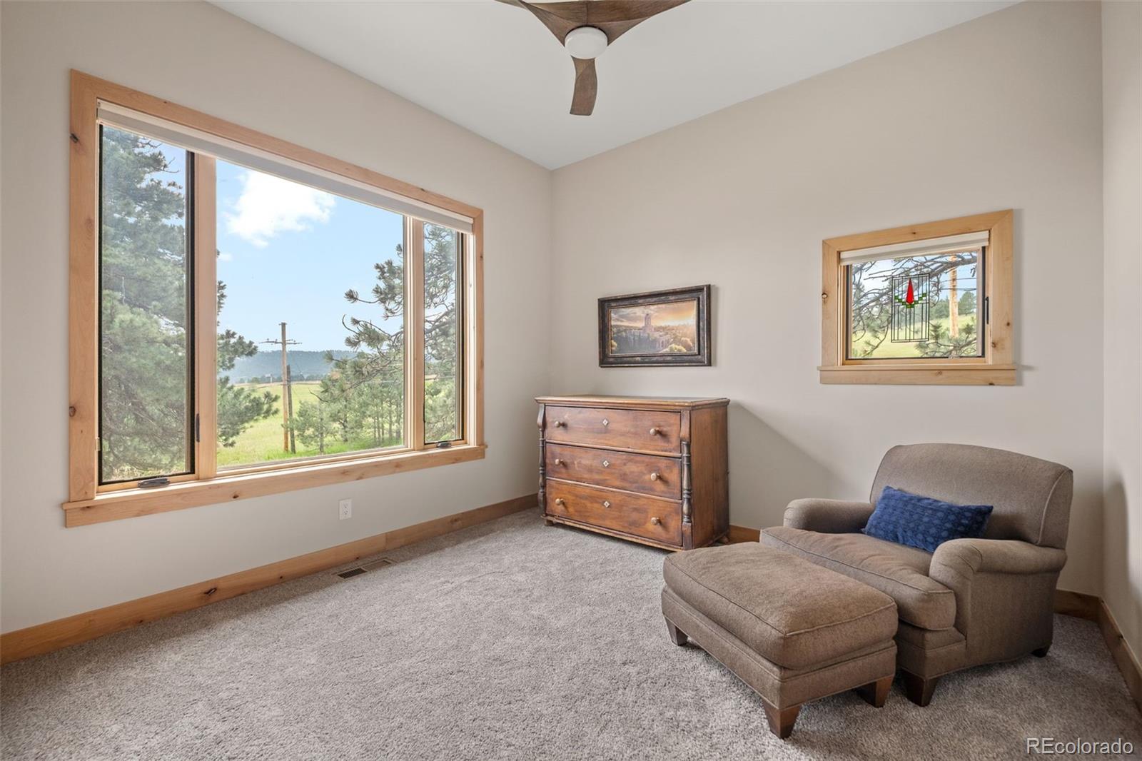 25350 Ridge Way Golden, CO 80401 - Photo 21 of 47 a bedroom with furniture and a window