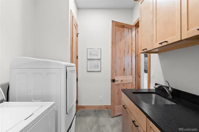 a view of livingroom with furniture hardwood floor and a ceiling fan