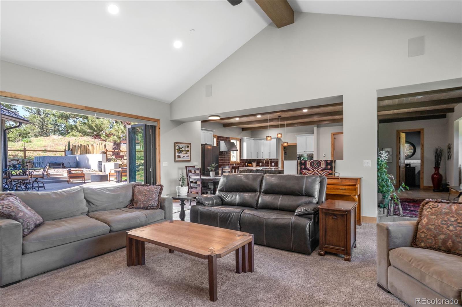 25350 Ridge Way Golden, CO 80401 - Photo 7 of 47 a living room with furniture and a large window