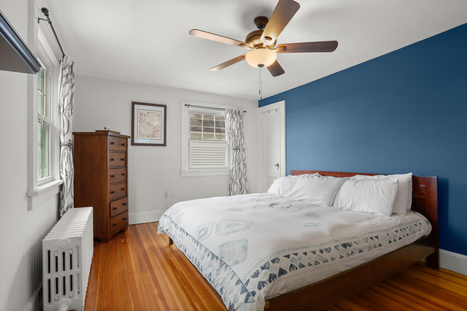54 Ridgewood Avenue Stamford, CT 06907 - Photo 15 of 31 a bedroom with a bed dresser and a window