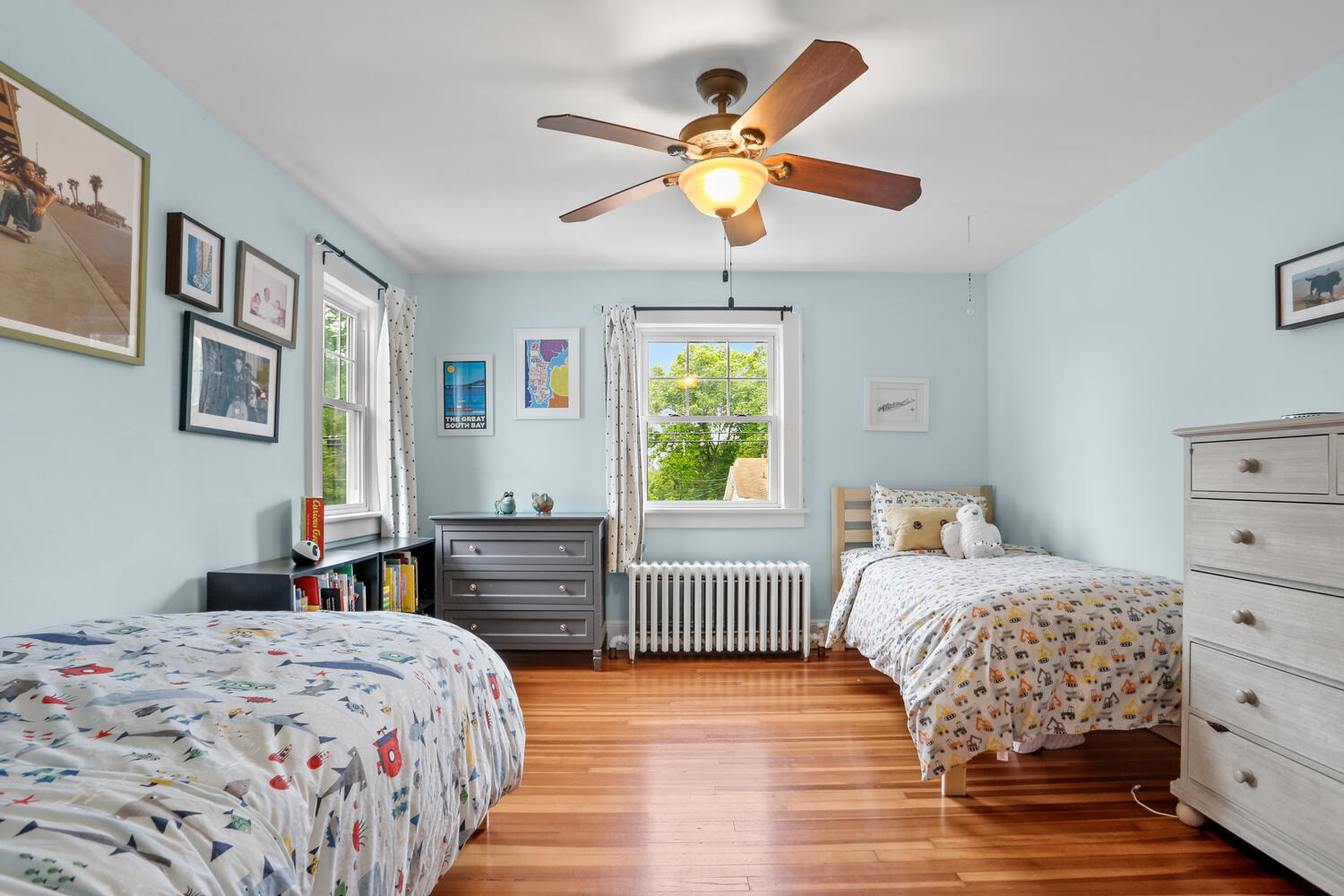 54 Ridgewood Avenue Stamford, CT 06907 - Photo 17 of 31 a bedroom with a bed and a dresser