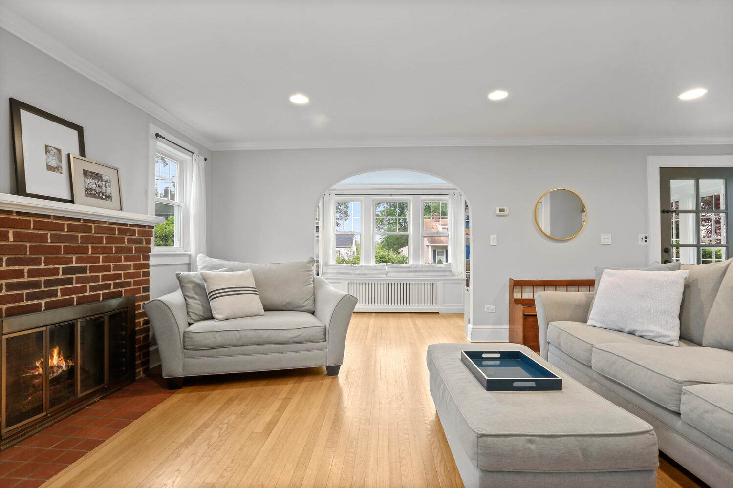 54 Ridgewood Avenue Stamford, CT 06907 - Photo 6 of 31 a living room with furniture and a fireplace