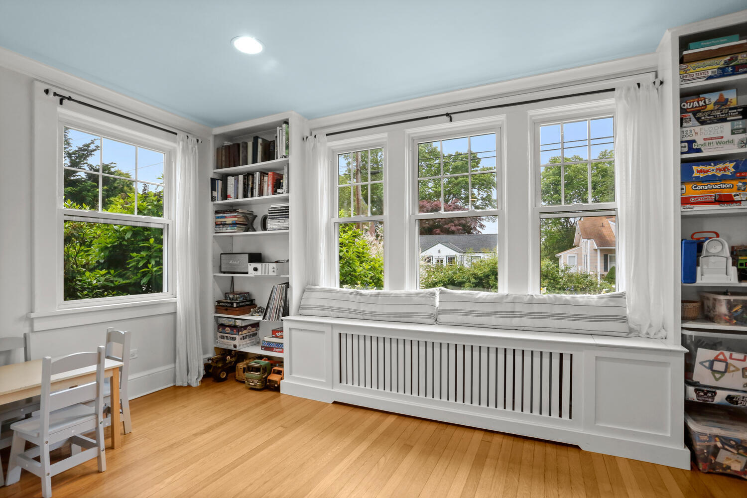 54 Ridgewood Avenue Stamford, CT 06907 - Photo 8 of 31 a view of a livingroom with furniture wooden floor and a window