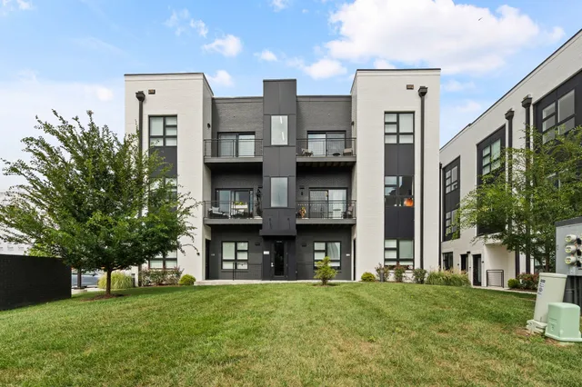 a view of building with yard