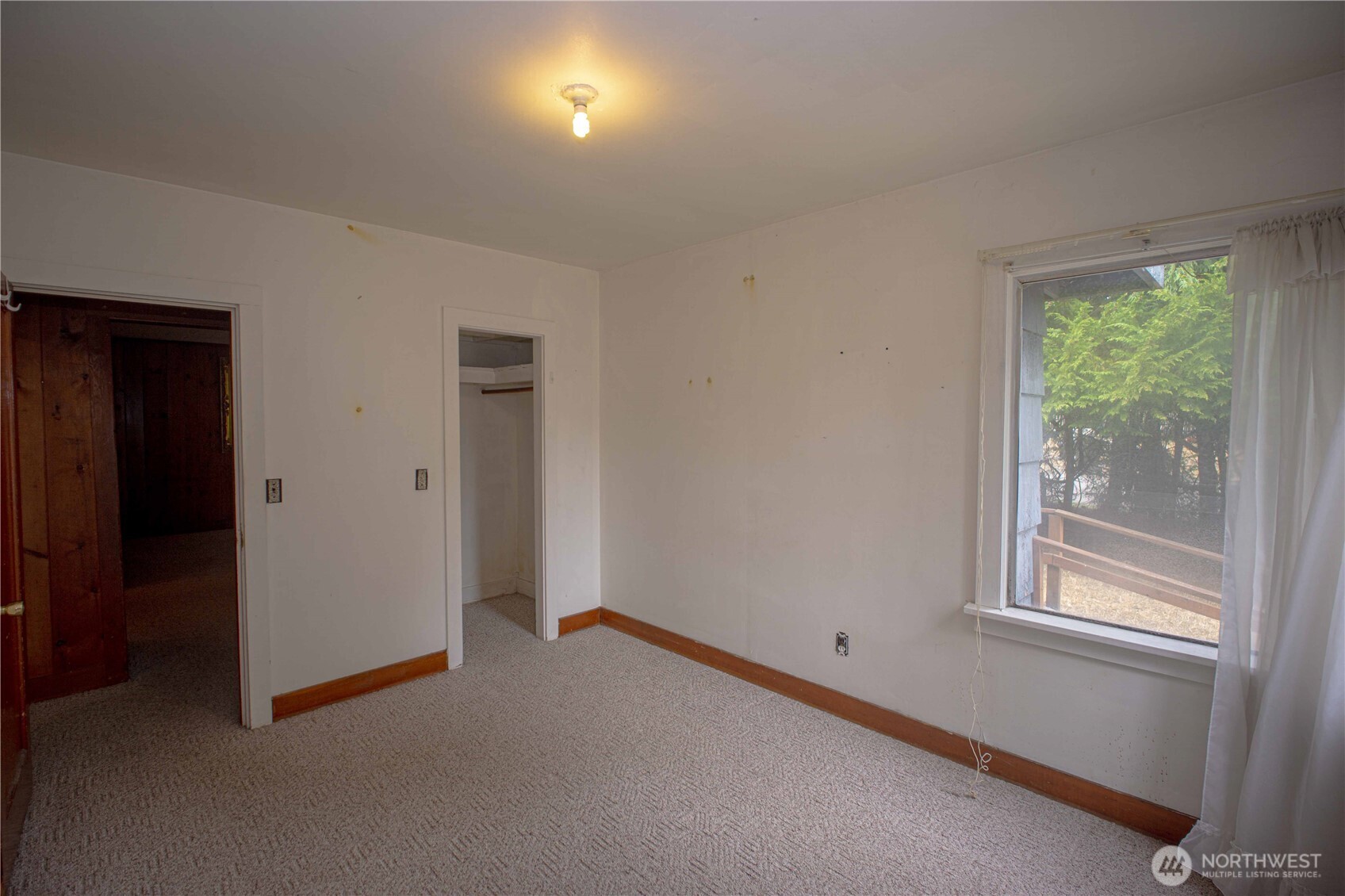 1122 West Spruce Street Port Angeles, WA 98363 - Photo 16 of 30 a view of an empty room with a window