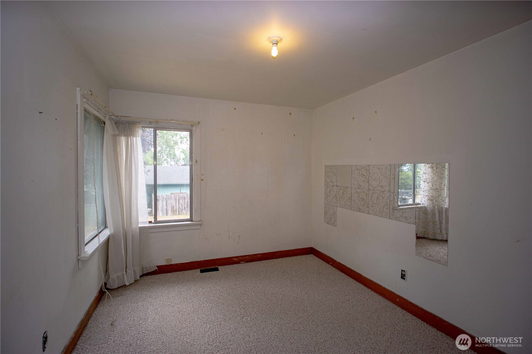 1122 West Spruce Street Port Angeles, WA 98363 - Photo 17 of 30 an empty room with windows